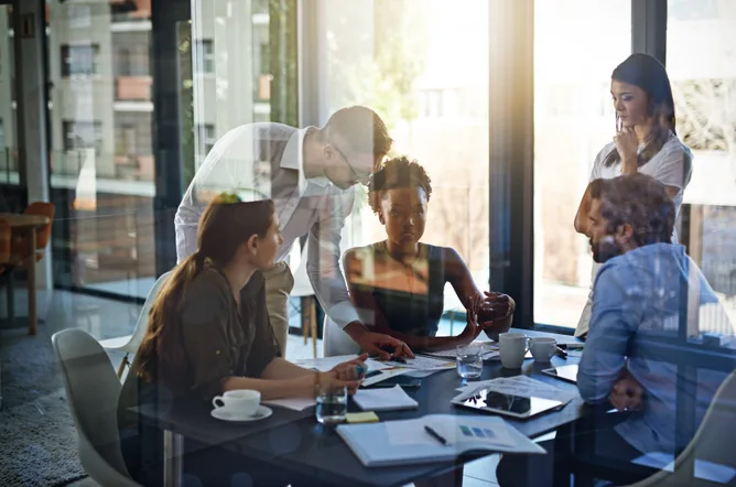 Group of businesspeople having a meeting in a boardroom